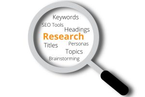 Magnifying glass highlighting SEO topic and keyword analysis terms
